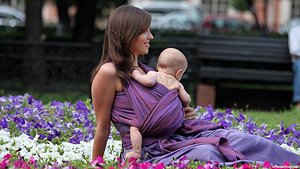 Pregnancy/ healing birth/ bonding. mother and baby in purple sling shot wide version