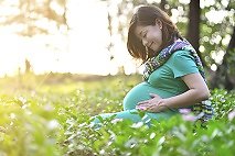 Pregnancy/ healing birth/ bonding. pregnant woman smiling in nature